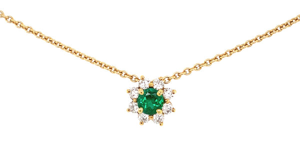 columbian emerald and diamond  halo pendant floral inspired in 18 kt yellow gold necklace.