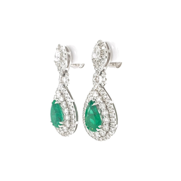 important columbian emerald and diamond drop pear shaped earrings in 18 k white gold.