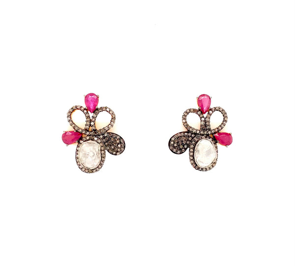 polki diamond and ruby flower design earring in oxidized sterling silver.