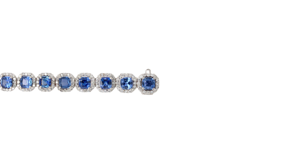 gem quality statement blue ceylon sapphire and diamond bracelet in 18 kt white gold.