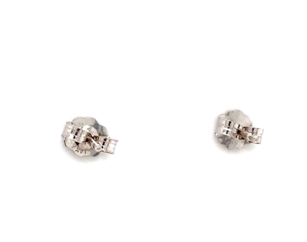 blue sapphire post and diamond earring jackets in 14 kt white gold.