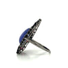 pear-shaped tanzanite with pink tourmaline, diamonds, and oxidized sterling silver fashion ring