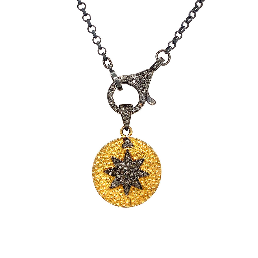 round disc pendant with diamond encrusted star design on diamond clasp oxidized silver and gold vermeil