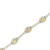 vivid fancy intense yellow cushion cut and white diamond tennis station bracelet 18k white gold