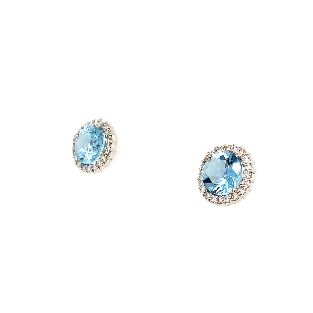 aquamarine and diamond halo earrings in 14 kt white gold