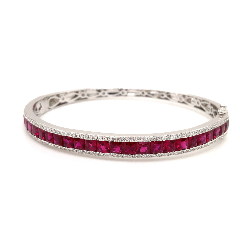 fine burmese princess cut ruby and diamond bangle bracelet in 18 kt white gold.