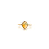 hand made petite fine crystal opal bezel set ring. set in 18k yellow gold