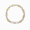 fancy intense yellow cushion shaped and white diamond bracelet set in 18 kt white gold