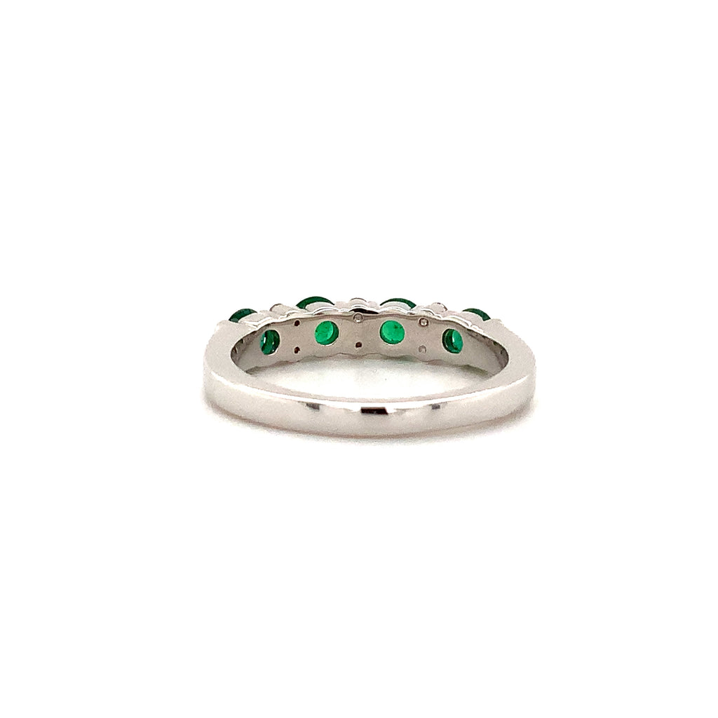 classic emerald and diamond straight line shared prong band in 18k white gold