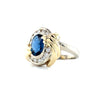blue sapphire and diamond ring set in 14kt white and yellow gold.