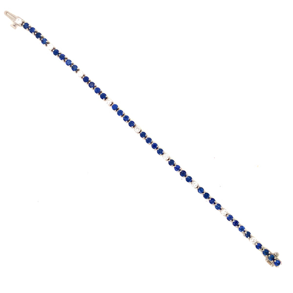 straight-line 3 prong classic gem quality bright blue sapphire and diamond bracelet set in 18k white gold