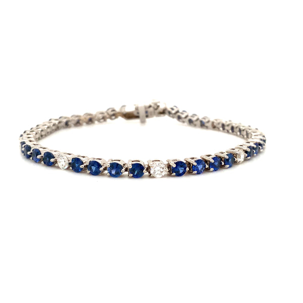 straight-line 3 prong classic gem quality bright blue sapphire and diamond bracelet set in 18k white gold