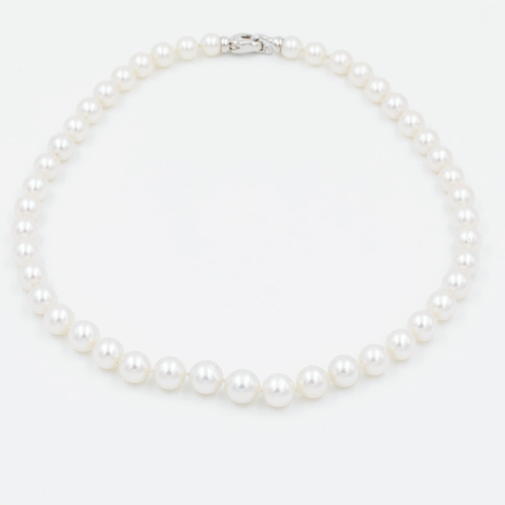 south sea cultured 9.08-11.20 mm aaa  pearl necklace knotted 18 inches long with heart shaped foldover diamond clasp