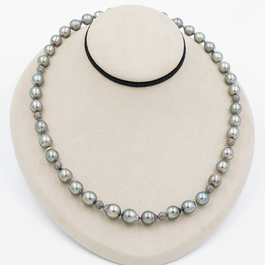 cultured circle natural black tahitian south sea 9.0 - 9.5 mm pearl knotted strand with diamond paved beads in sterling silver.