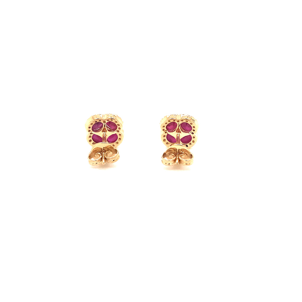 ruby and diamond cluster oval and princess cut post earrings in 14 kt yellow gold.