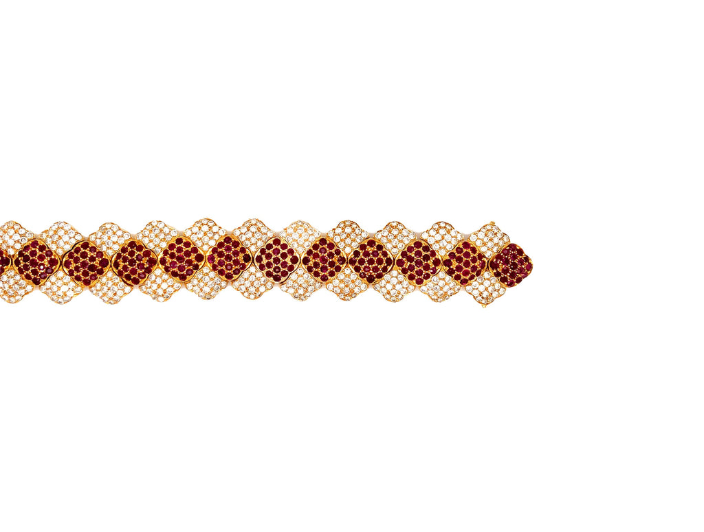 one of a kind ruby and diamond pavée set bracelet 18k yellow gold.