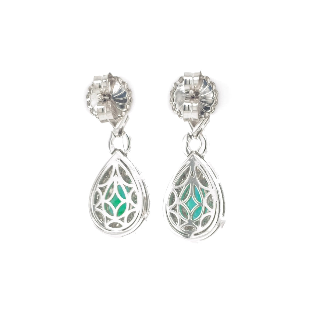 important columbian emerald and diamond drop pear shaped earrings in 18 k white gold.