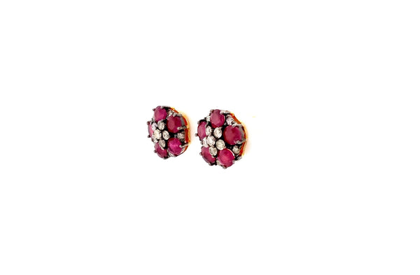 ruby and diamond flower design earring in oxidized sterling silver.
