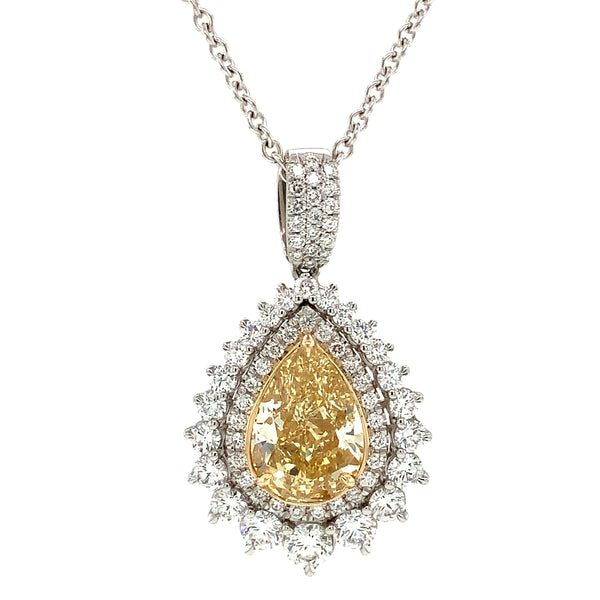 three carat fancy yellow pear shaped diamond pendant in platinum and 18 kt gold gia fy vvs2