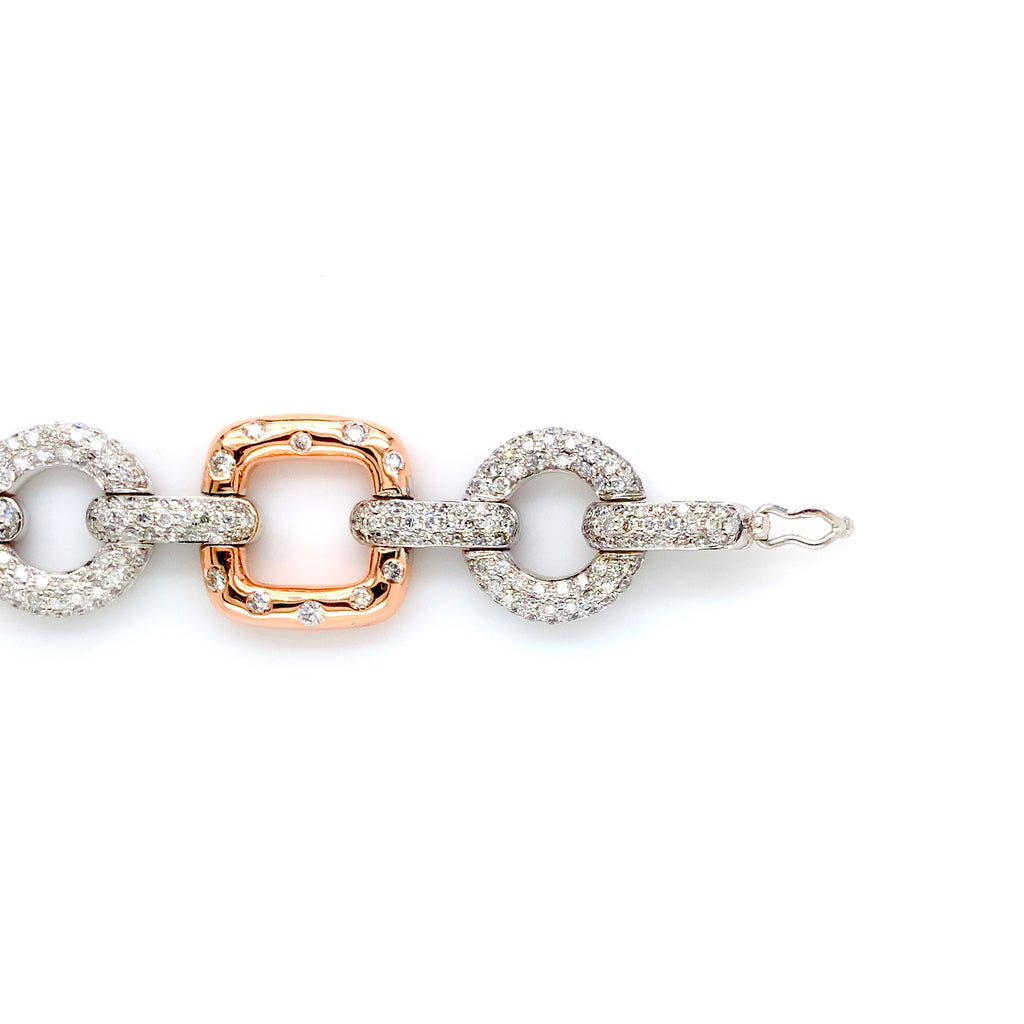 diamond pavée  link bracelet in 14 kt rose and white gold.