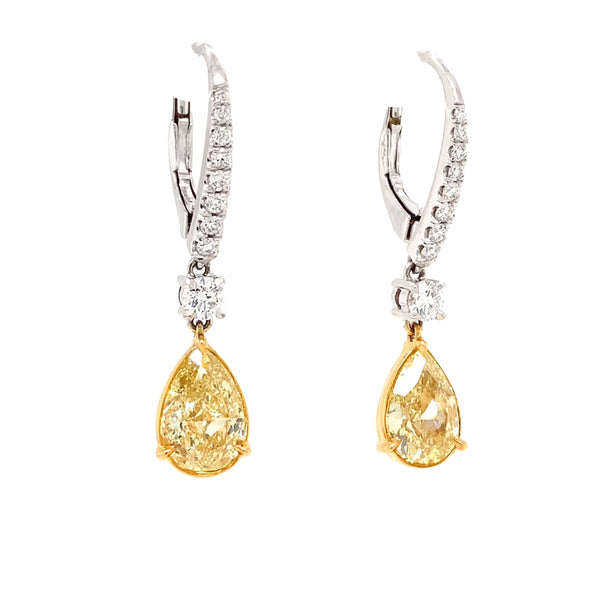 fancy yellow pear shape diamond drop earrings in 18 kt white gold gia certified