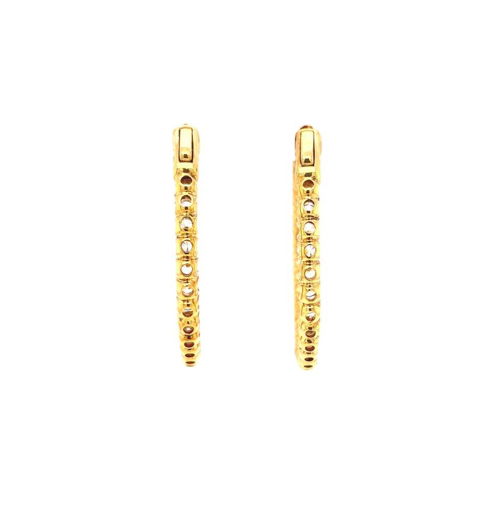 cz inside-out hoop earrings in gold color with secure lock