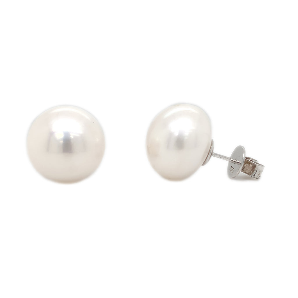 large 16 mm button white freshwater pearl post earrings in 14k white gold