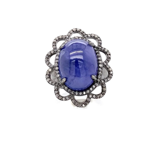 large oval cabochon tanzanite and diamond ring in oxidized sterling silver.