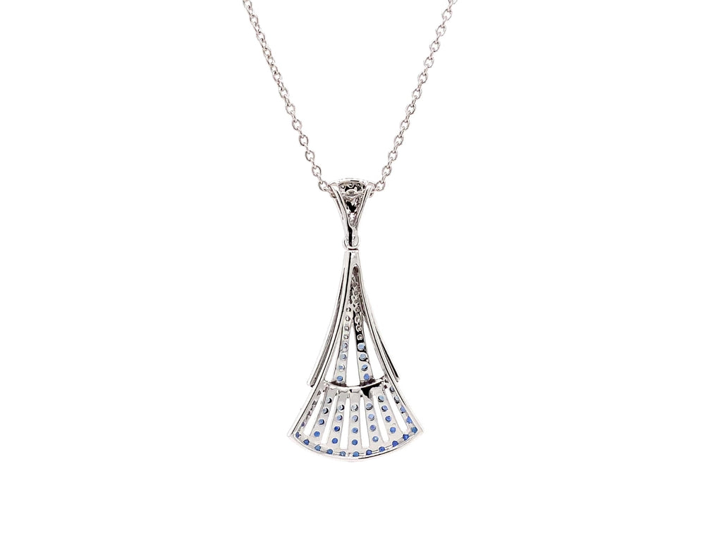 blue sapphire and diamond paved lavalier pendant in 14 kt white gold.