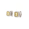 fancy yellow cushion white brilliant diamond halo earring in 18 kt white and yellow gold.