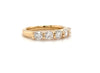 five stone diamond wedding and anniversary band in 18 kt yellow gold.