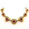 seven hearts shaped ruby and diamond necklace 18k yellow gold panther link chain.
