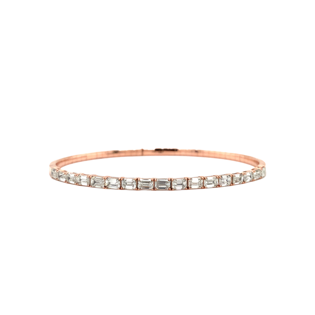 flexi single row emerald cut diamond tennis bracelet 2.50 carats t.w. set in 14k rose gold.