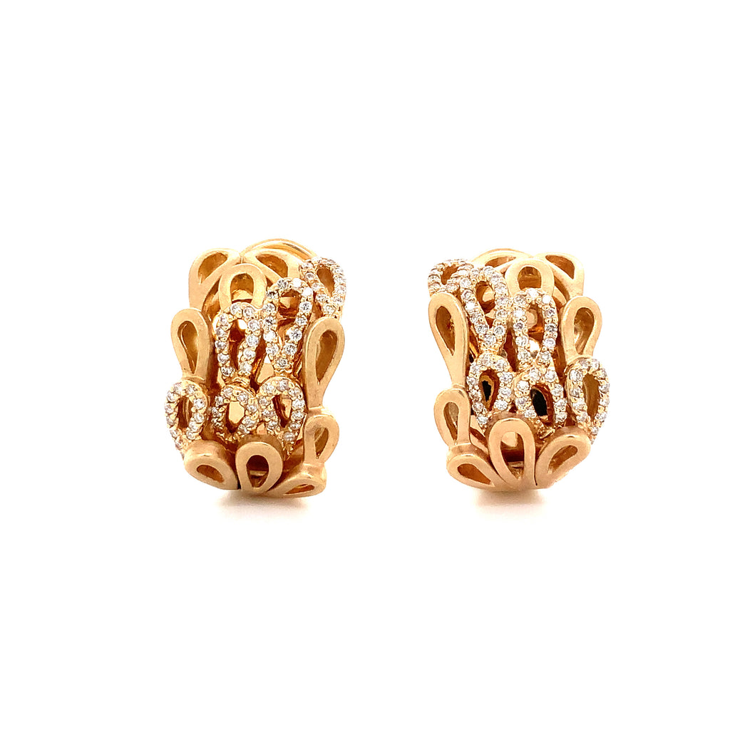 diamond pavé paisley design earrings omega clip back set in 14 kt yellow gold.