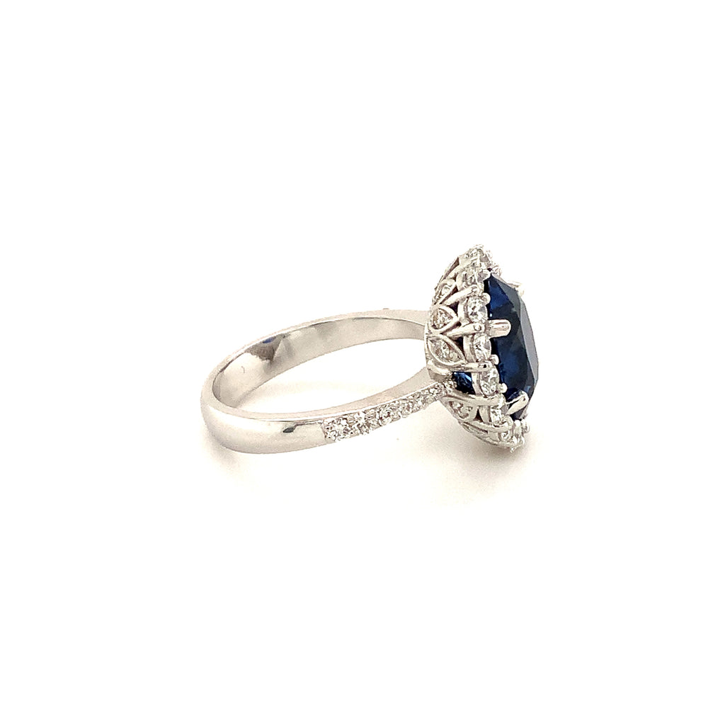 blue sapphire and diamond ring custom made in 14 kt white gold. 3.58 cts