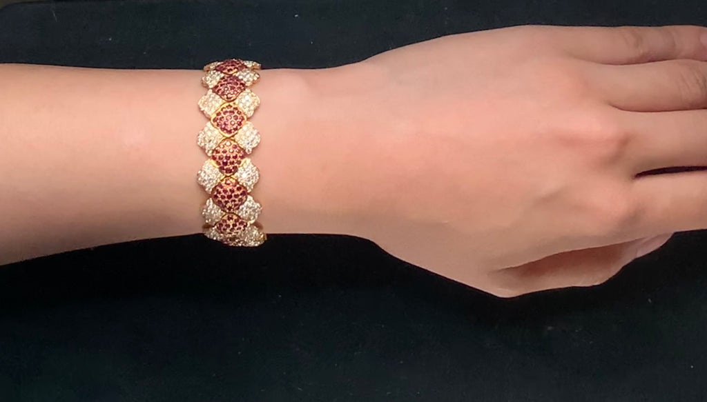 one of a kind ruby and diamond pavée set bracelet 18k yellow gold.