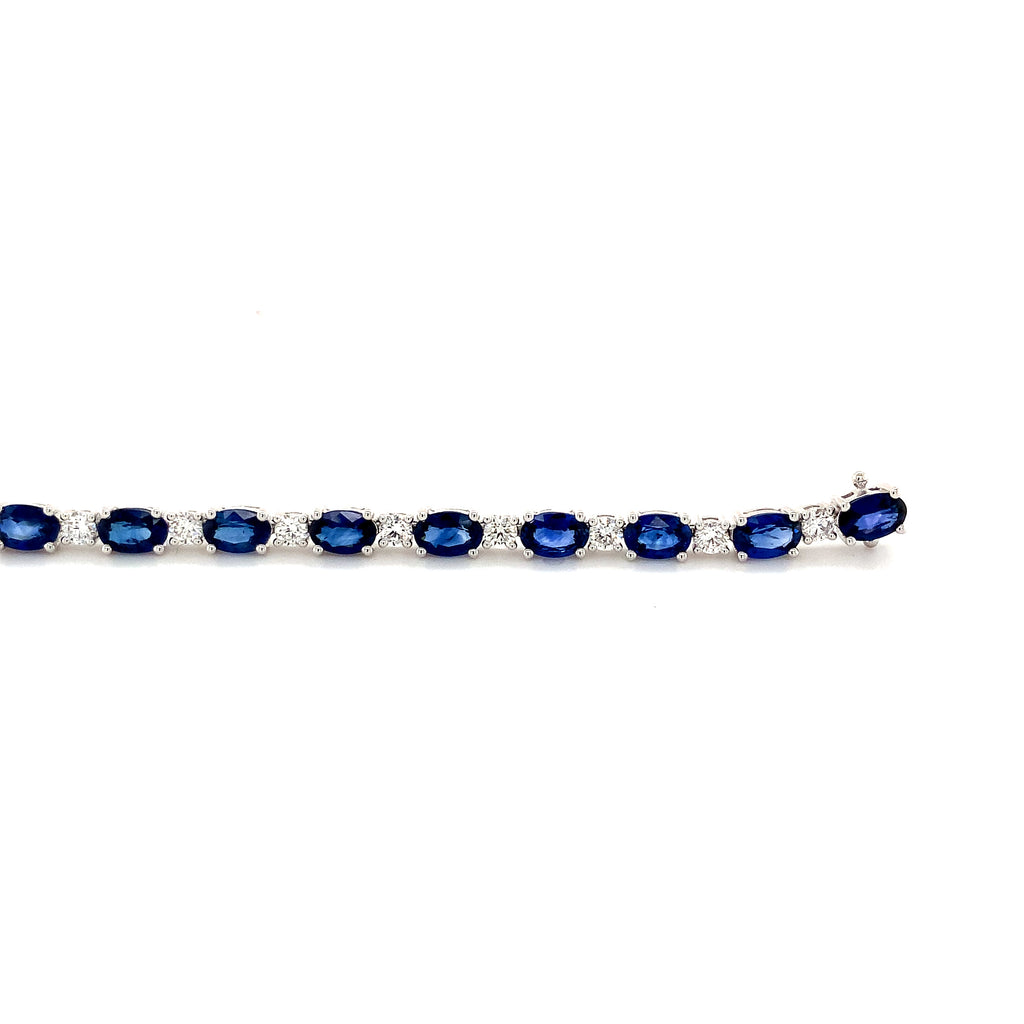 gem quality  natural ceylon bright blue sapphire and diamond bracelet prong set in 18k white gold,