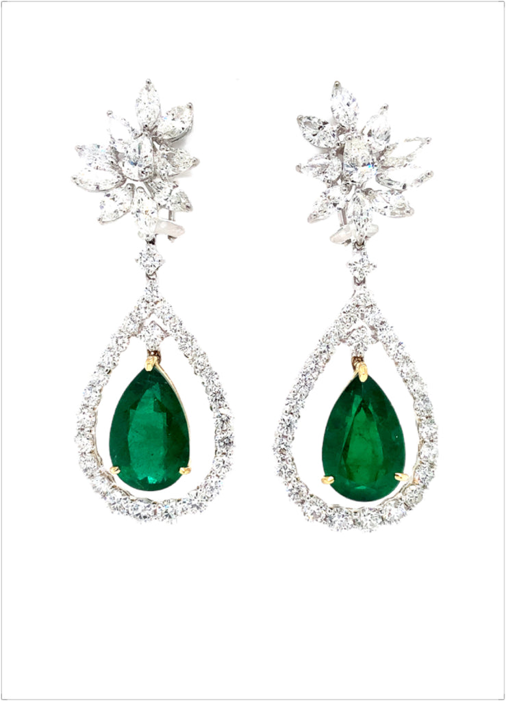 important pear shape natural african emerald and diamond earrings set in 18kt two tone gold.