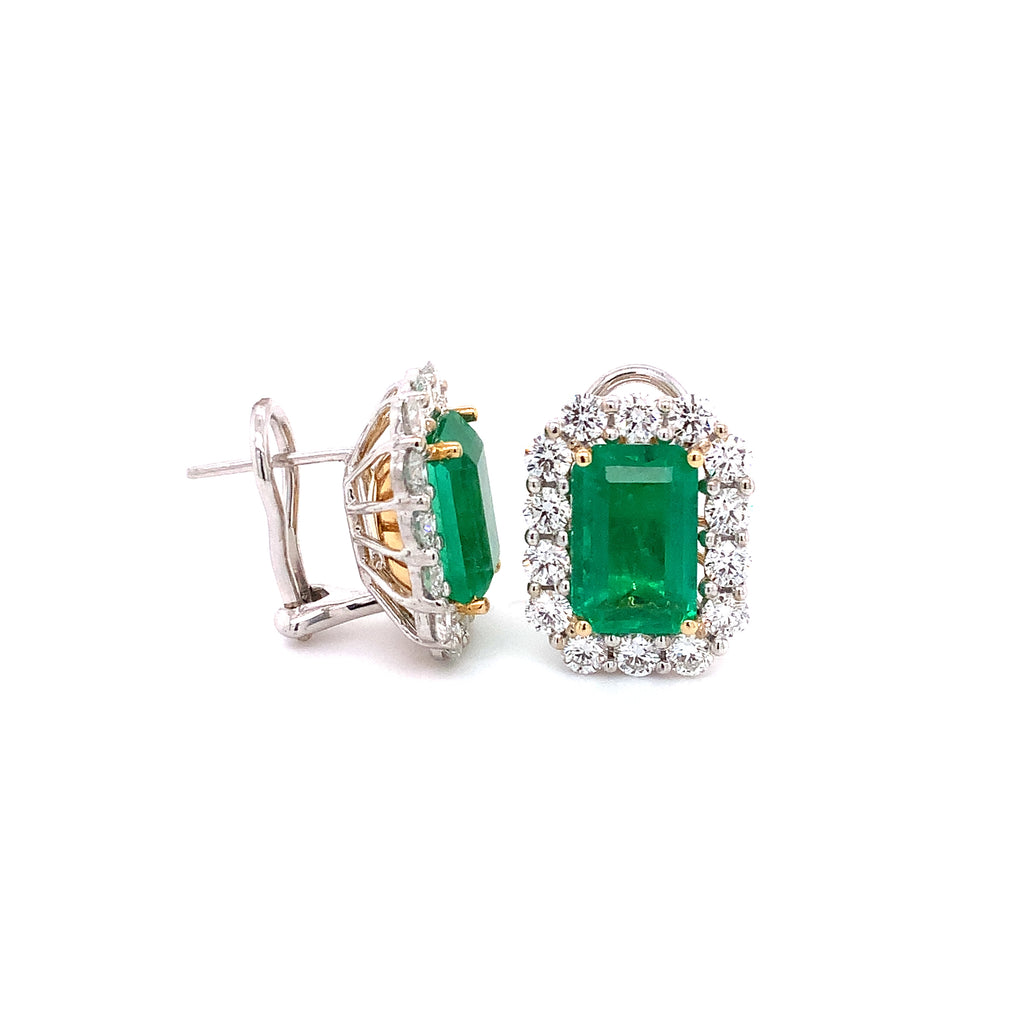 important emerald and diamond halo statement earring handmade in 18 kt white gold.