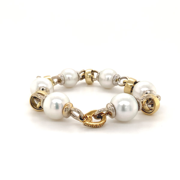 hand made south sea pearl bracelet 18kt yellow gold and 14kt white gold.